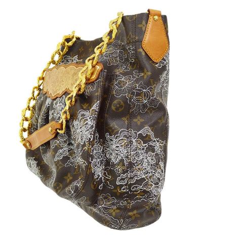 louis vuitton shoulder bag gold chain|Louis Vuitton wallet with chain.